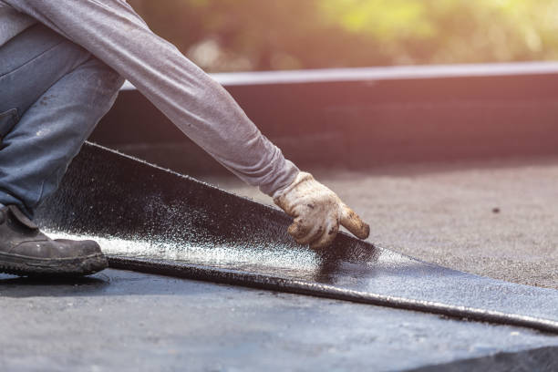 Professional Basement Waterproofing technician working in Elmwood, TN
